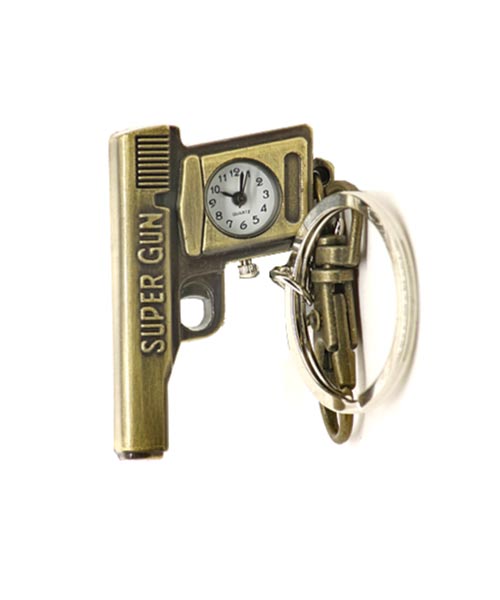 Bronze key chain quartz watch with clasp and gun pendant.