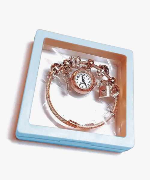 Buy Gold colour trinkets charm style bracelet bangle watch at best price India.